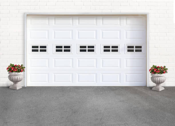 garage door with flower plants on both sides garage door with flower plants on both sides